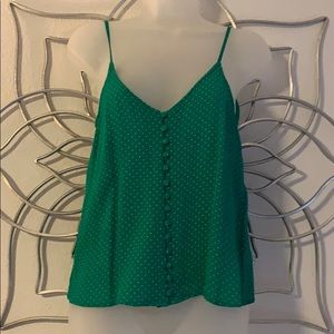 Green and white polka dot top
